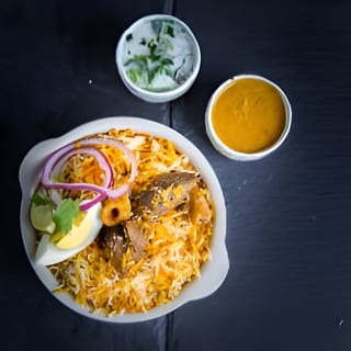 Temper Goat Dum Biryani
